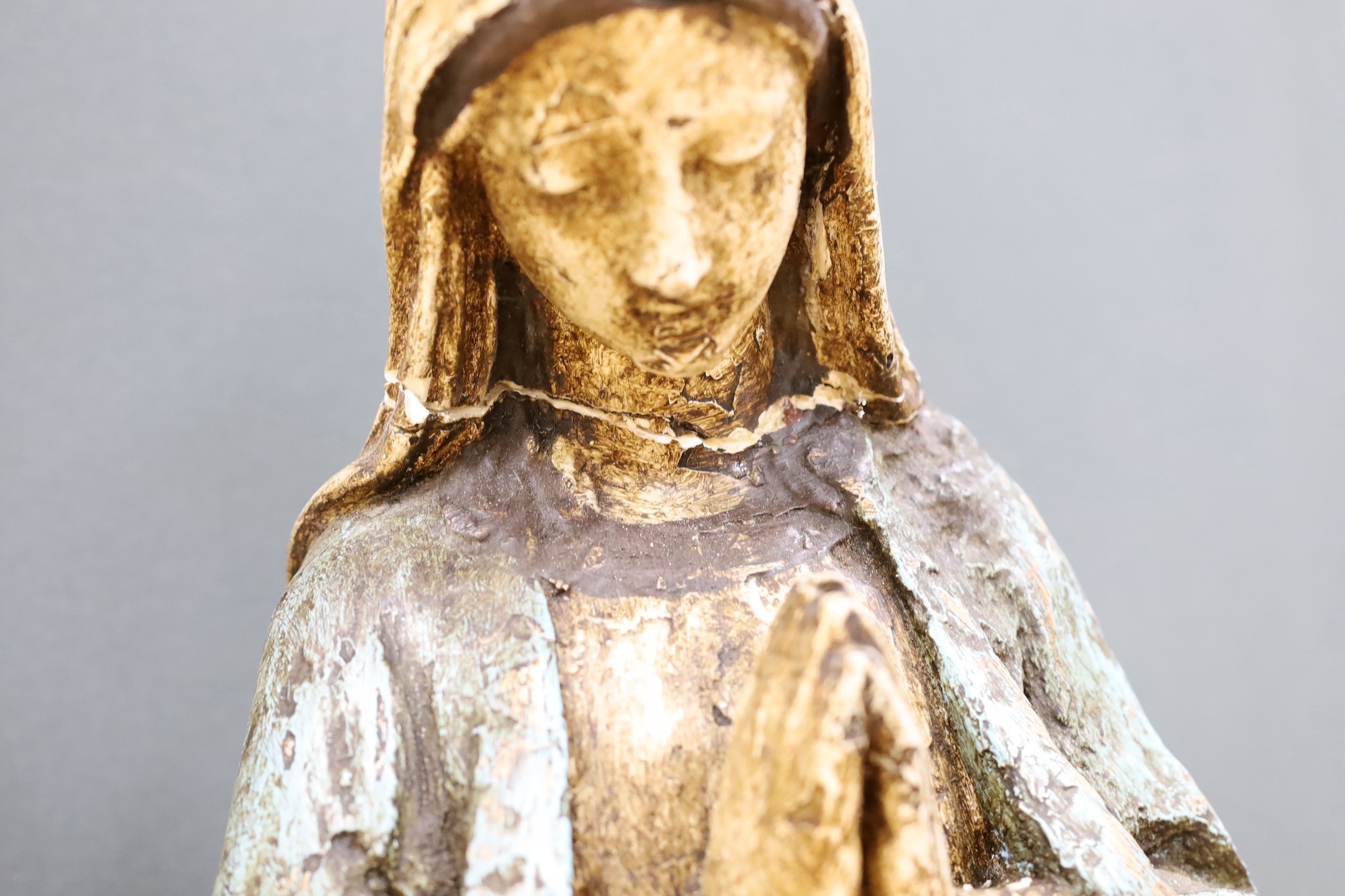 A large painted plaster figure of a Madonna, 82cm